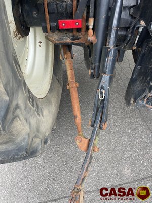 Tracteur agricole New Holland TS 100 avec chargeur 