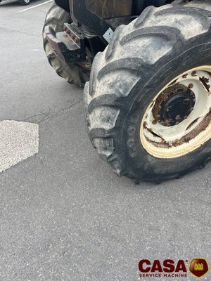 Tracteur agricole New Holland TS 100 avec chargeur 