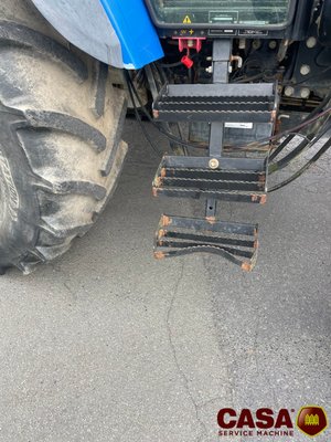 Tracteur agricole New Holland TS 100 avec chargeur 