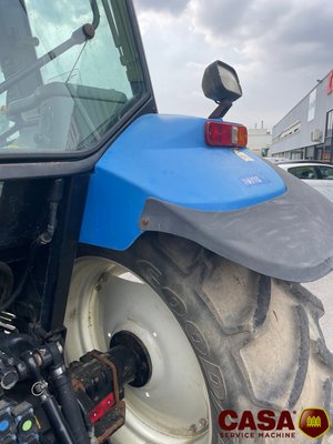 Tracteur agricole New Holland TS 100 avec chargeur 