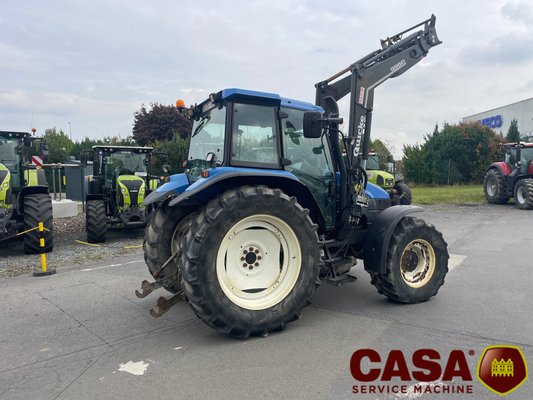 Tracteur agricole New Holland TS 100 avec chargeur 