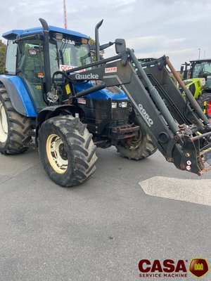 Tracteur agricole New Holland TS 100 avec chargeur 