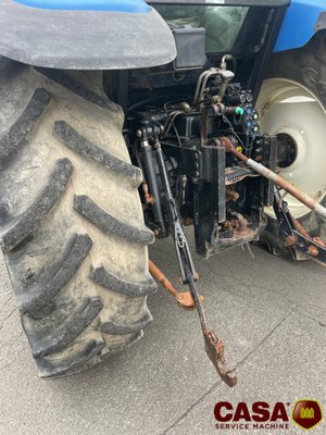 Tracteur agricole New Holland TS 100 avec chargeur 