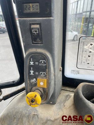 Tracteur agricole New Holland TS 100 avec chargeur 