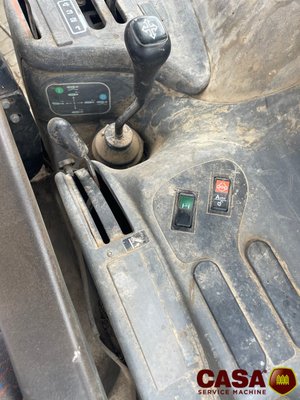Tracteur agricole New Holland TS 100 avec chargeur 