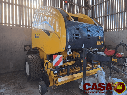 Presse à balles rondes New Holland Roll bett 180 