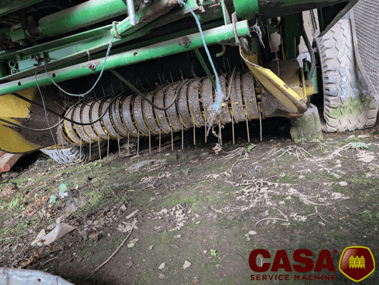 Presse à balles rondes John Deere 550