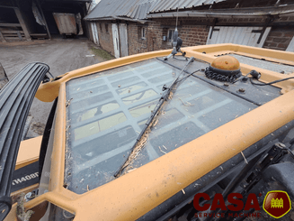 Chariot télescopique agricole Cat TH 408 D