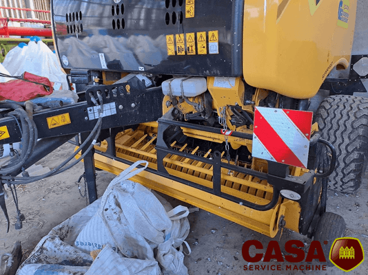 Presse à balles rondes New Holland Roll bett 180 