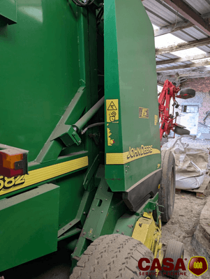 Presse à balles rondes John Deere 582