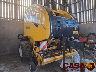 Presse à balles rondes New Holland Roll bett 180 