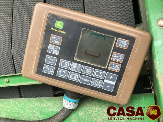 Presse à balles rondes John Deere 864 rotoflow