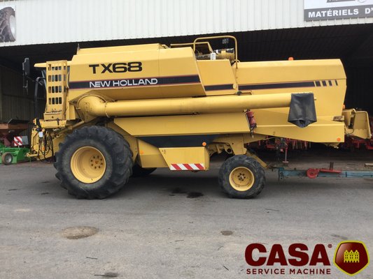 Moissonneuse batteuse New Holland TX 66
