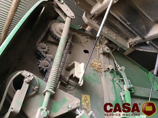 Presse à balles rondes John Deere 864 rotoflow