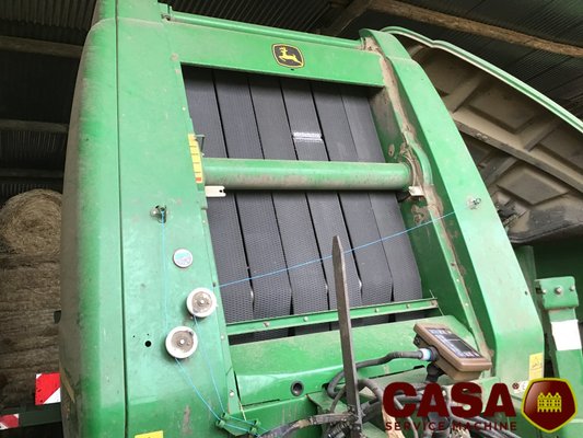Presse à balles rondes John Deere 864 rotoflow