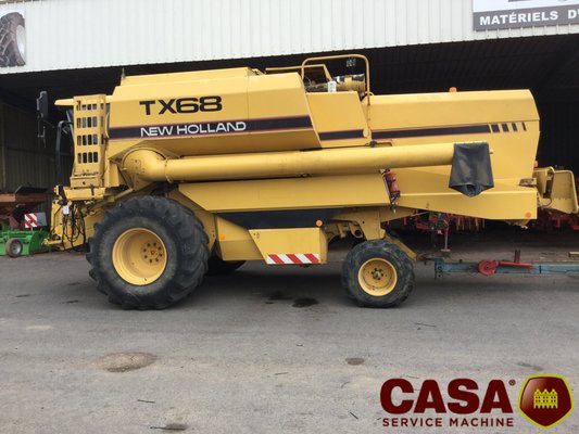 Moissonneuse batteuse New Holland TX 66