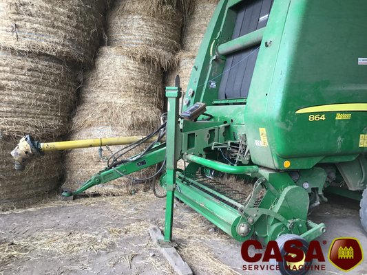 Presse à balles rondes John Deere 864 rotoflow