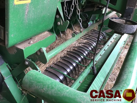 Presse à balles rondes John Deere 864 rotoflow