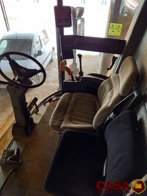 Moissonneuse batteuse New Holland tx 66
