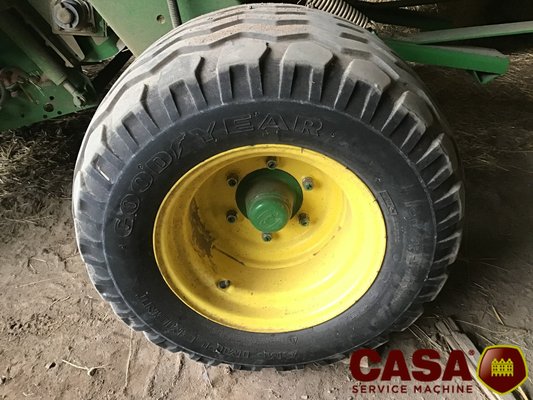 Presse à balles rondes John Deere 864 rotoflow