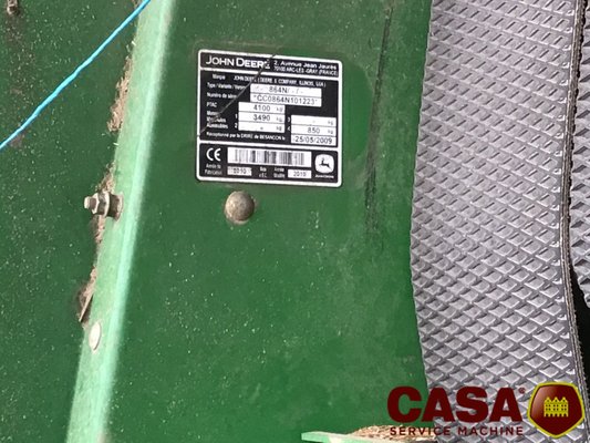 Presse à balles rondes John Deere 864 rotoflow