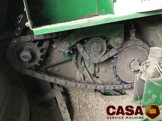 Presse à balles rondes John Deere 864 rotoflow