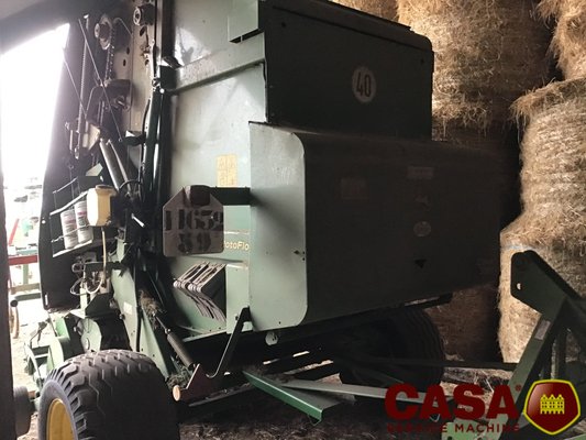 Presse à balles rondes John Deere 864 rotoflow