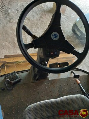 Moissonneuse batteuse New Holland tx 66