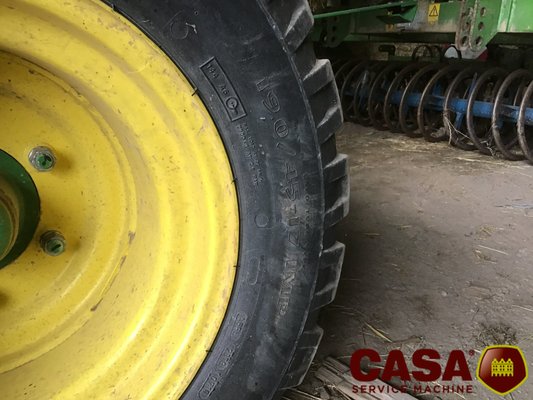 Presse à balles rondes John Deere 864 rotoflow